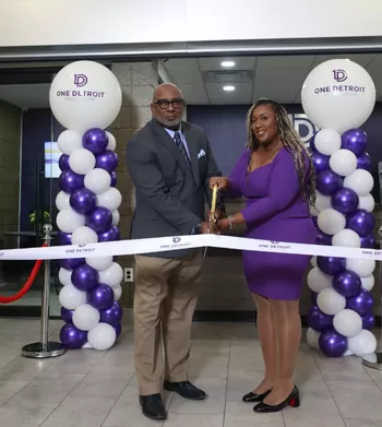 One Detroit CEO Portia Powell cuts the ribbon with Inkster mayor to open a new branch
