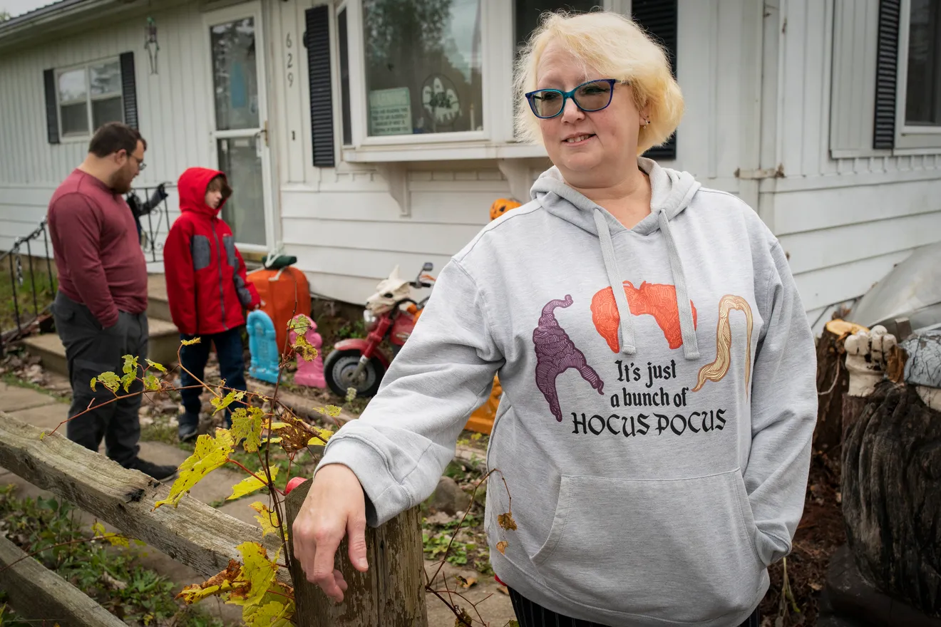 Detroit woman standing in front yard